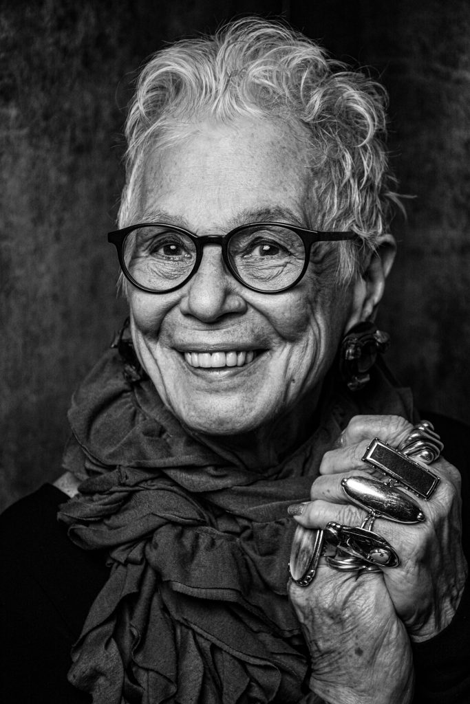 Black and white photograph of a smiling Susann Craig