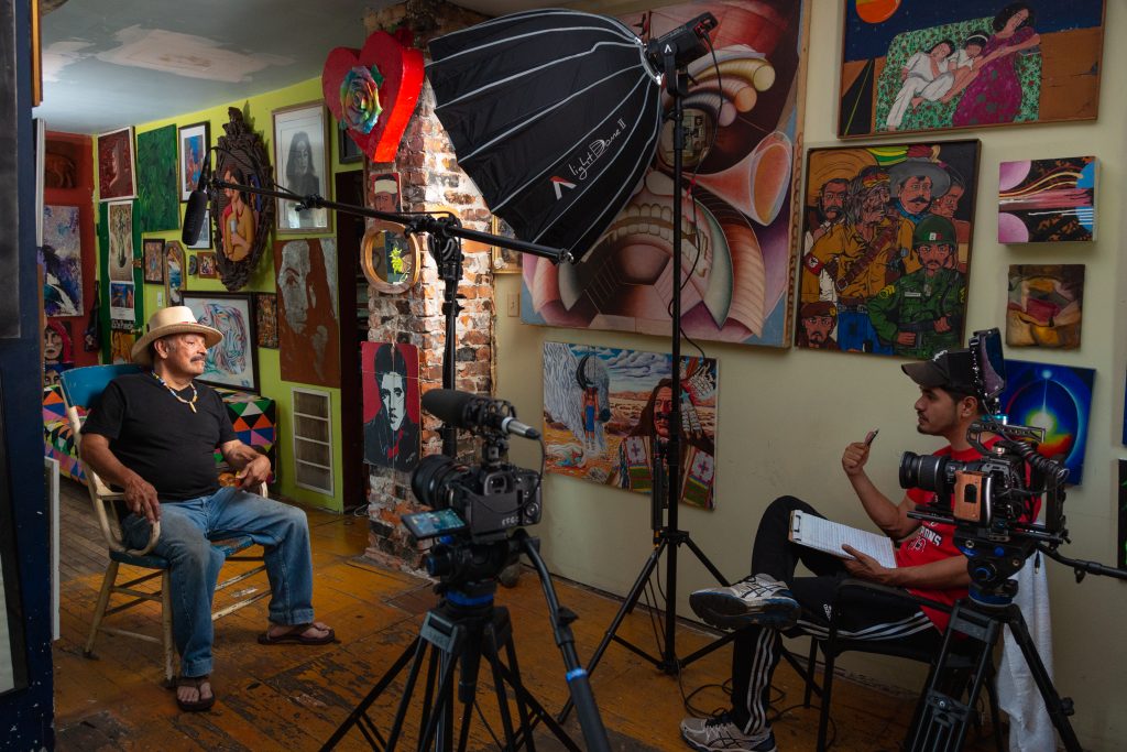 Photo of artist Roman Villarreal with filmmaker Steven Walsh, filming SOUTHEAST
